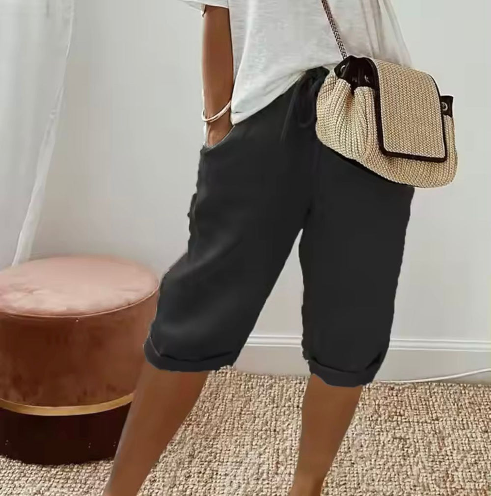 Women's cropped trousers with drawstring waist and rolled cuffs