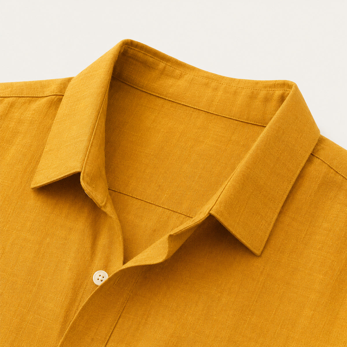 Men's long-sleeve button-down shirt with pointed collar and curved hem