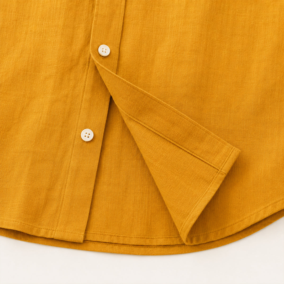 Men's long-sleeve button-down shirt with pointed collar and curved hem