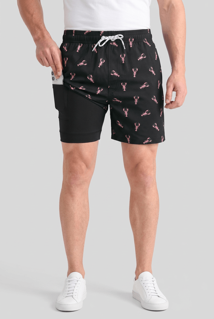 Men's printed swim shorts with drawstring waist and inner shorts