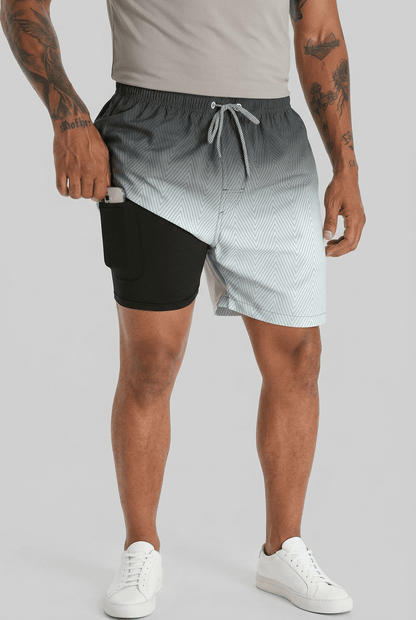 Men's printed swim shorts with drawstring waist and inner shorts