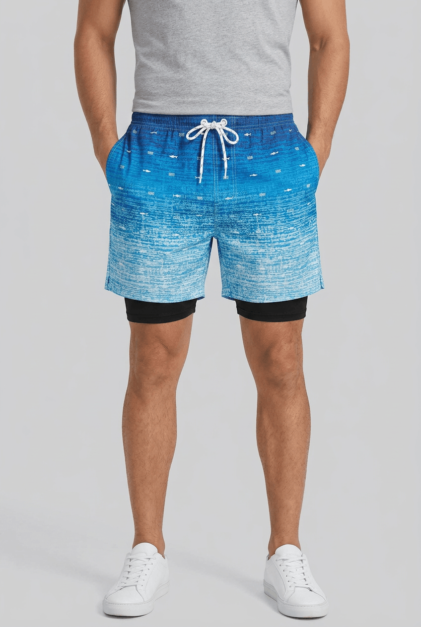 Men's printed swim shorts with drawstring waist and inner shorts
