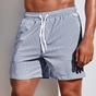 Men's striped swim shorts with drawstring waist and side pockets