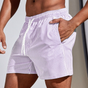 Men's striped swim shorts with drawstring waist and side pockets