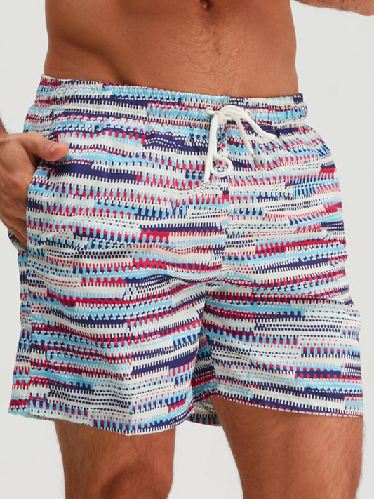 Men's blue abstract graphic swim shorts with elasticated drawstring waist
