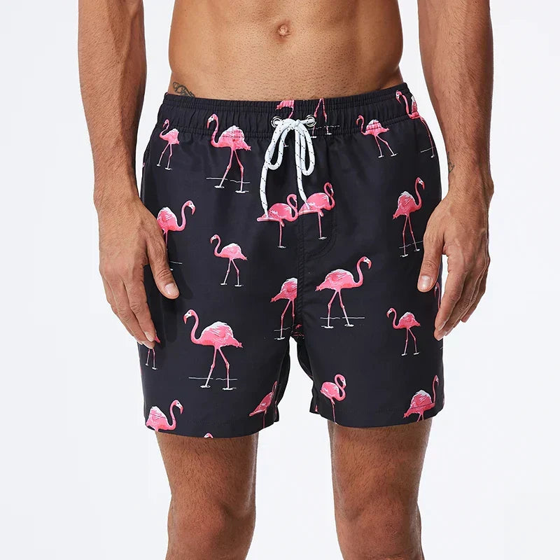 Men's printed swim shorts with elastic drawstring waist and side pockets