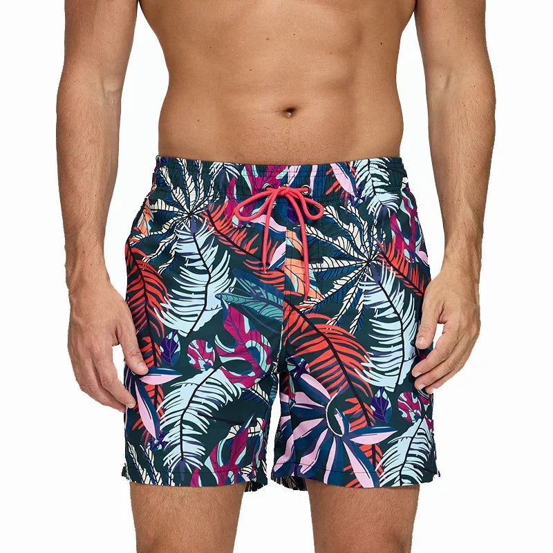 Men's printed swim shorts with elastic drawstring waist and side pockets