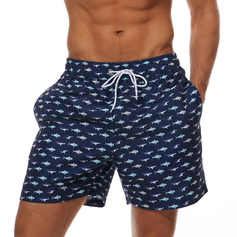 Men's printed swim shorts with elastic drawstring waist and side pockets