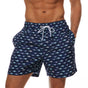 Men's printed swim shorts with elastic drawstring waist and side pockets