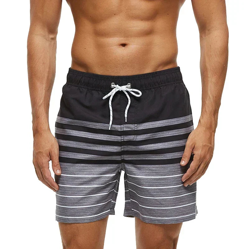 Men's printed swim shorts with elastic drawstring waist and side pockets