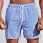 Men's striped drawstring swim shorts with elasticated waist and side pockets