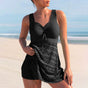 Women's one-piece swimsuit with ruched bodice and patterned skirt overlay