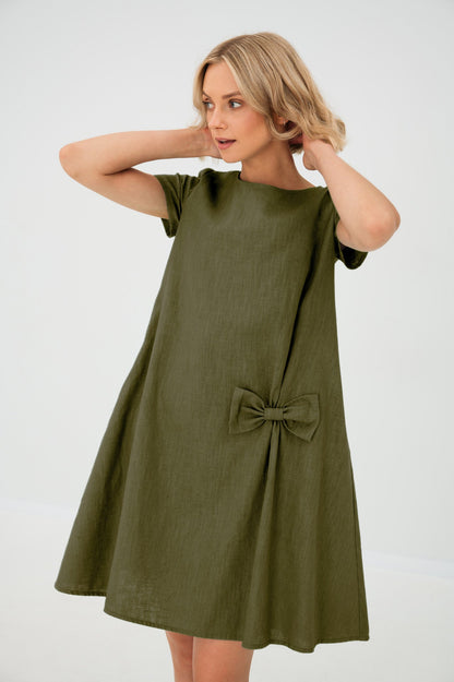 Women's A-line short dress with round neckline, short sleeves, bow detail and front pockets