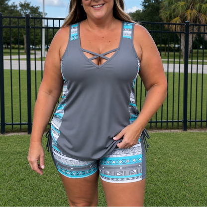 Women's geometric tankini swimsuit set with sleeveless V-neck top and patterned shorts