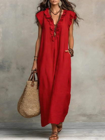 Women's bohemian maxi dress with ruffled V-neckline, cap sleeves and side pockets