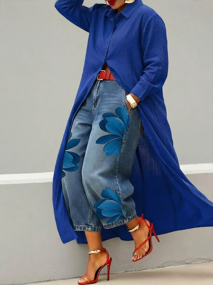 Women's long floral shirt dress worn over cropped wide-leg jeans
