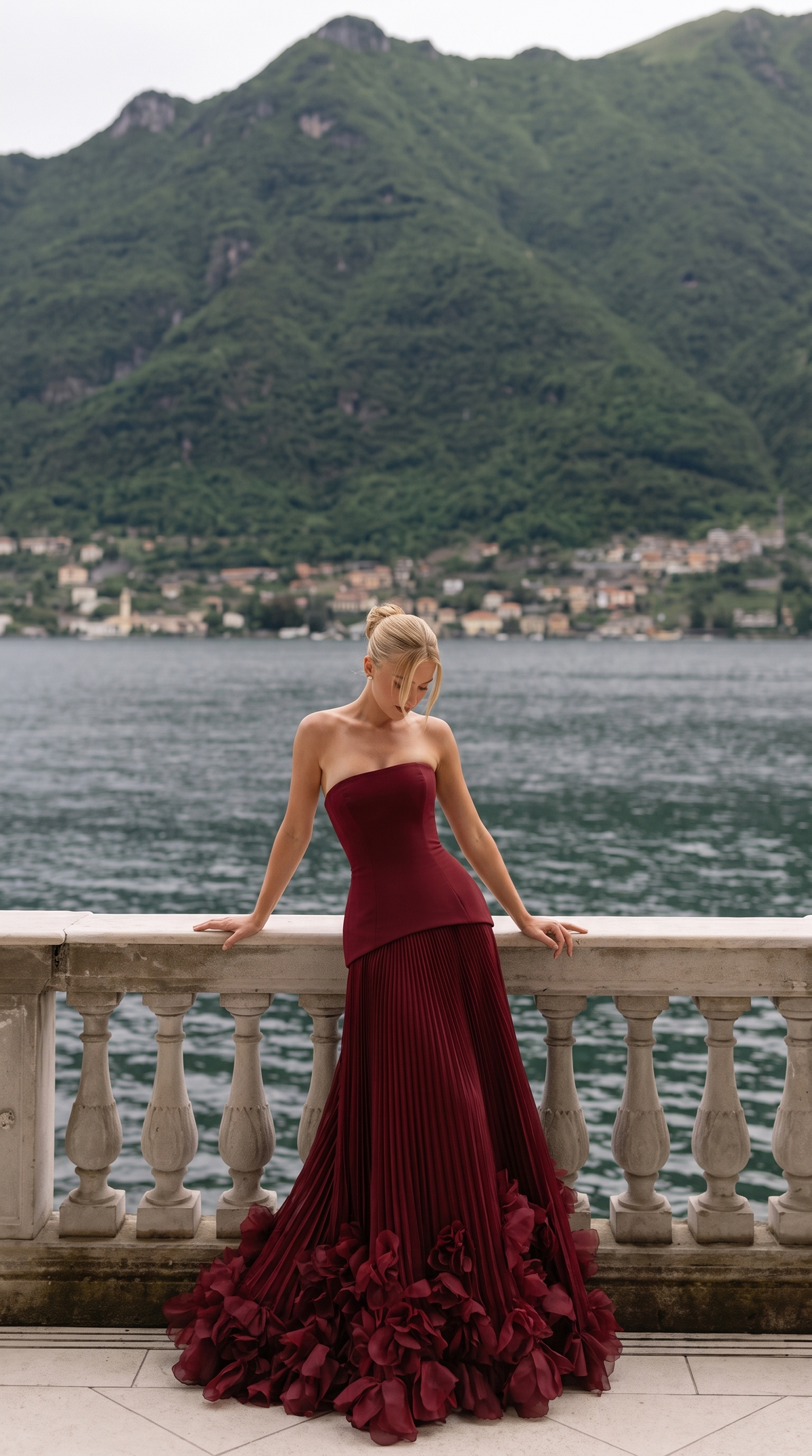 Women's strapless pleated maxi dress with floral appliqué hem