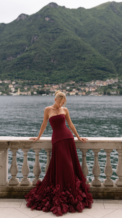 Women's strapless pleated maxi dress with floral appliqué hem