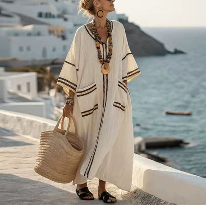 Women's striped relaxed midi dress with contrast trim and patch pockets