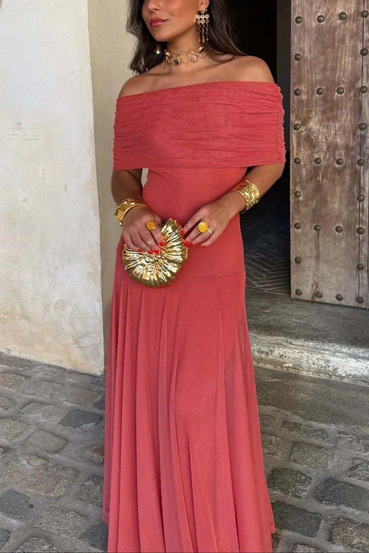 Women's pleated one-shoulder maxi dress with draped bodice and flowing skirt