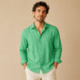 Men's long-sleeve button-down shirt with pointed collar and curved hem