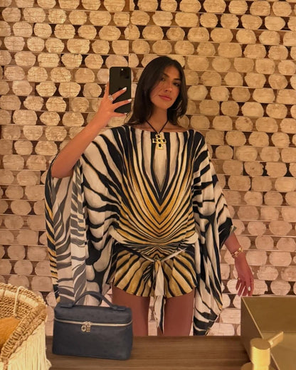 Women's black and cream zebra print kaftan mini dress with tie waist