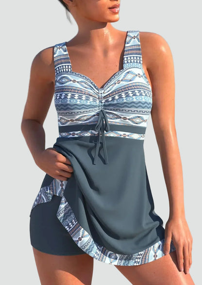 Women's geometric one-piece swimsuit with sweetheart neckline, wide straps and tie-front detail
