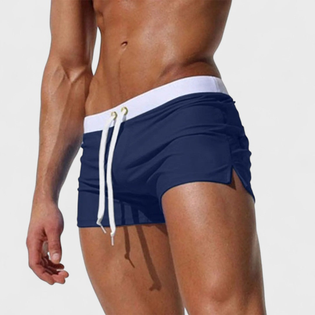 Men's short swim shorts with drawstring waist and side slit detail