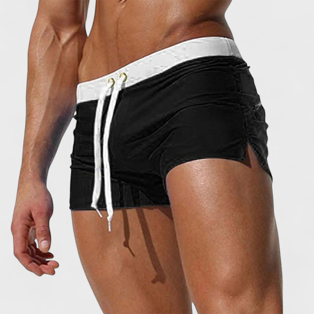 Men's short swim shorts with drawstring waist and side slit detail