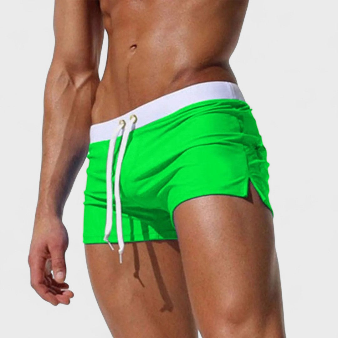 Men's short swim shorts with drawstring waist and side slit detail