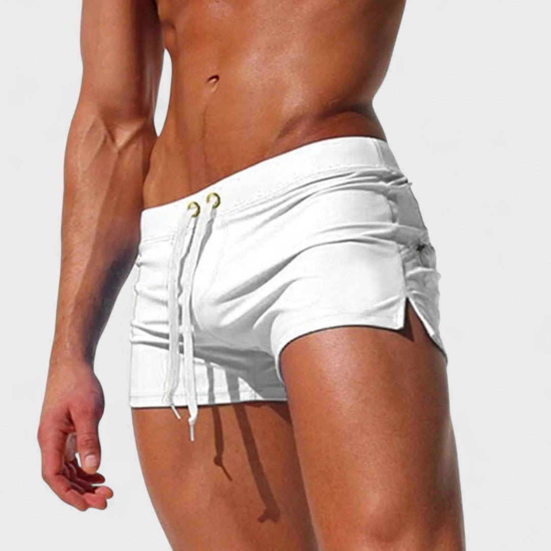 Men's short swim shorts with drawstring waist and side slit detail