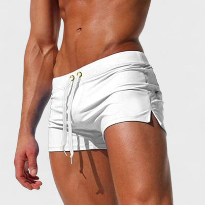 Men's short swim shorts with drawstring waist and side slit detail