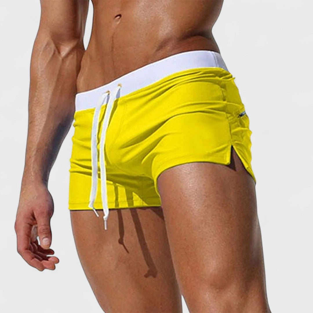 Men's short swim shorts with drawstring waist and side slit detail