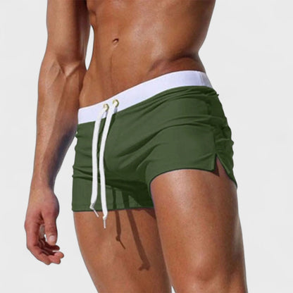 Men's short swim shorts with drawstring waist and side slit detail