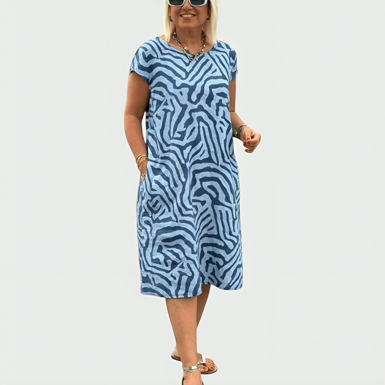 Women's abstract print midi dress with short sleeves and side pockets