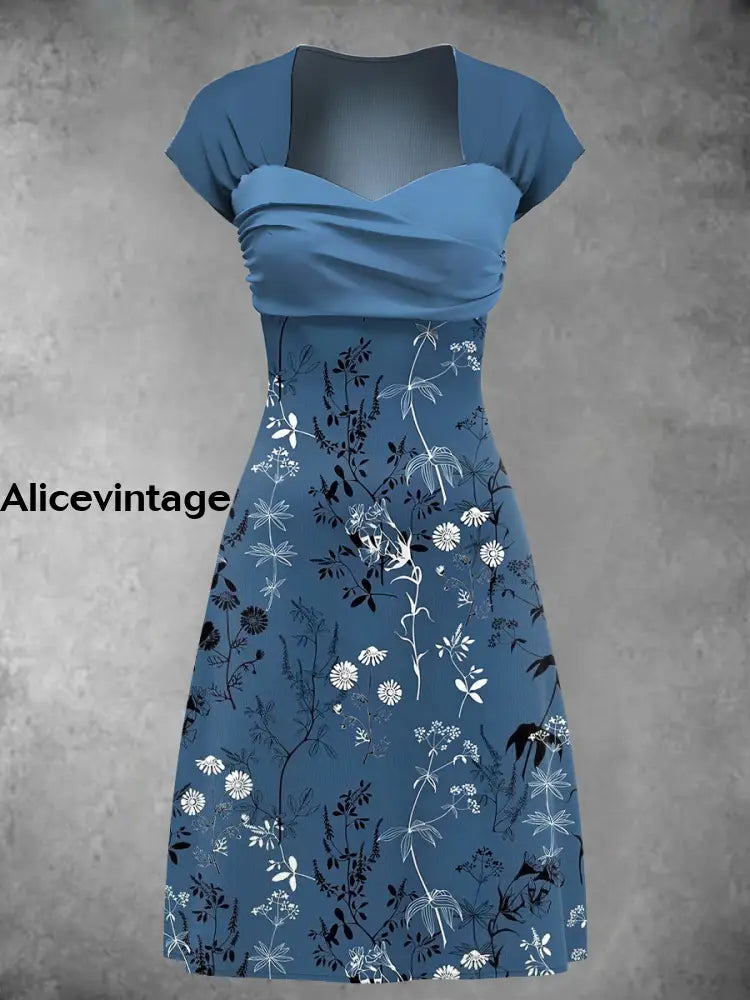 Women's blue floral midi dress with sweetheart neckline and short sleeves