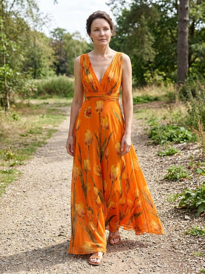 Women's sleeveless floral wrap maxi dress with V-neck and flowing skirt