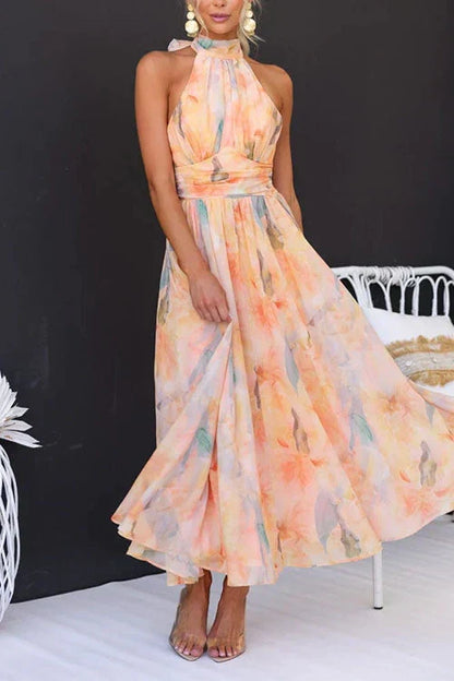 Women's multicolour abstract halter midi dress with open back and flowing skirt