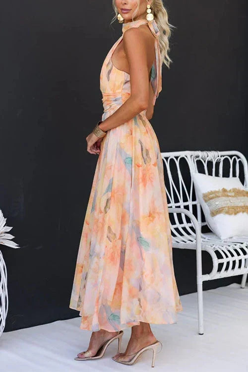 Women's multicolour abstract halter midi dress with open back and flowing skirt