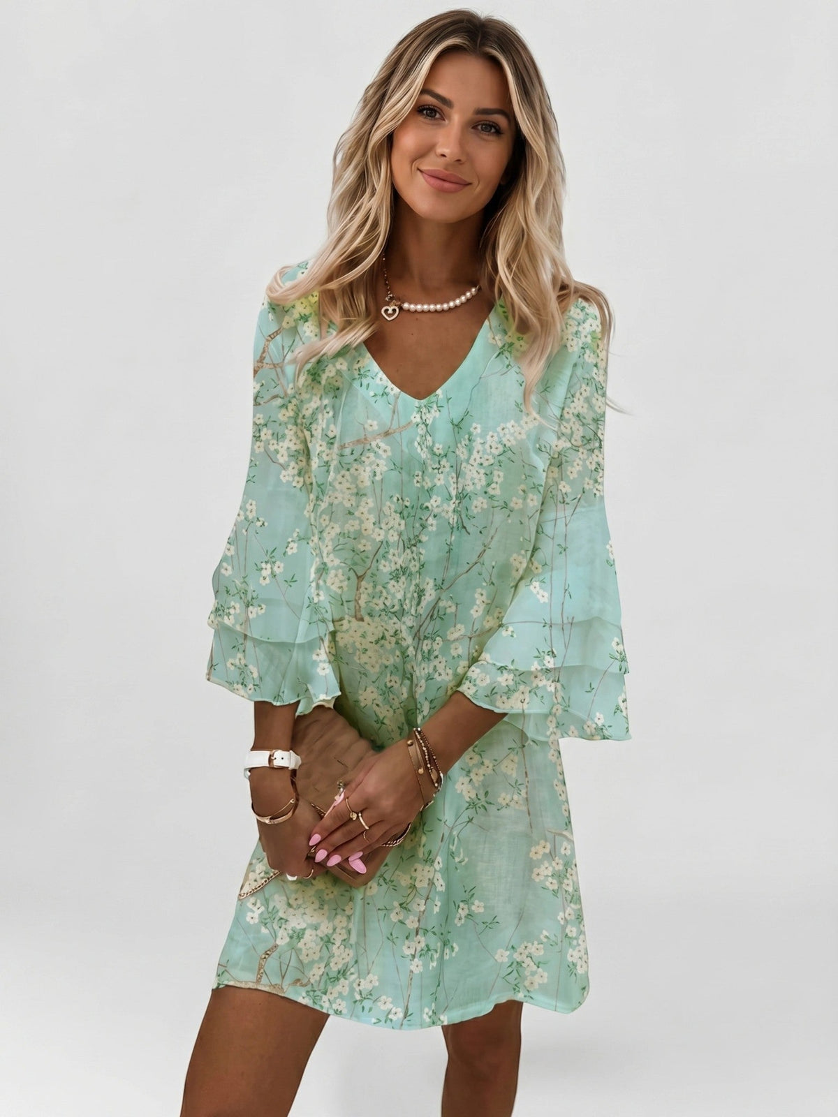 Women's abstract marble print mini dress with V-neck and flared three-quarter sleeves