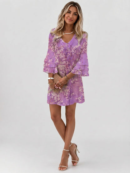 Women's abstract marble print mini dress with V-neck and flared three-quarter sleeves