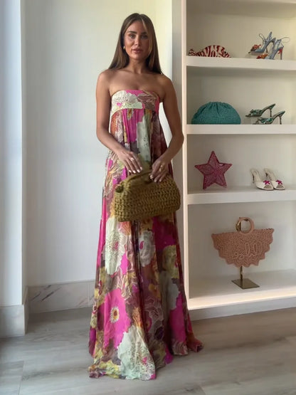 Women's strapless multicoloured floral maxi dress with flowing floor-length skirt