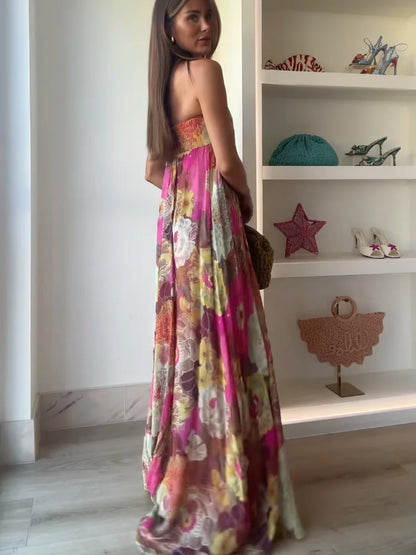 Women's strapless multicoloured floral maxi dress with flowing floor-length skirt